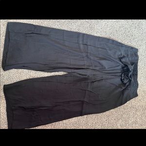 Black flared paper bag pants